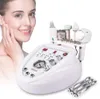 Équipement de salon 5In1 Diamond Peeling Dermabrasion Épurateur de peau Microcourant Machine de levage de visage Pulvérisation d'eau Dissolvant de points noirs