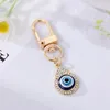 Evil Eye Hamsa main coeur porte-clés porte-clés femmes cadeau bleu oeil sac voiture porte-clés breloque accessoires bijoux