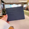 2022 nowych moda etui na karty kawior kobieta mini portfel projektant pure color prawdziwej skóry żwirowa tekstura luksusowy czarny portfel Y2210002