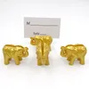 50st indiskt tema bröllop gynnar guld elefant plats korthållare marockansk brudduschparti dekorativ namn kortfotohållare