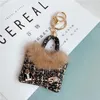 سلاسل المفاتيح الأوروبية والأمريكية الإبداعية Mink Plush Bag -keychain pendant diy شخصية خارج حلقة سلسلة المفاتيح ذات الجودة الواحدة