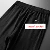 Erkeklerin izleme setleri yaz kısa kollu üstler elastik bel pantolon giyim iki parçalı set Kore Sokak Giyim eşyası büyük boyut G221010