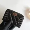 Kvinna lyxiga plånböcker Kohude Kreditkort Kvinnliga kaviar Purses äkta läderkortshållare Fashion Small Zipper Short Coin Purse