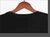 2022-2023 Summer Mens Designer T-shirt Casual Man Femme Tees avec lettres Imprimer manches courtes Top Vendre luxe Hommes Hip Hop vêtements # 6968 T-shirts