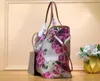 Capsule de jardin Sac à bandoulière d'hiver Shopping Véritables sacs à main sacs à main dames fourre-tout Porte-monnaie 2pcs ensemble portefeuille carte M21352 Pochette all-over sacs de fleurs