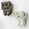 Kledingopslag naadloos muur gemonteerd schoenenrek