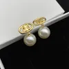 Boucles d'oreilles pendantes de créateur Lady Stud Oreads Luxury Pearl Diamond Gold Personalité de mariage Jewelry306i