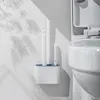 Le siège de toilette couvre la brosse en silicone TPR et le bol de support avec des poils suspendus au mur pour le sol