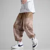 Pantaloni da uomo Streetwear da uomo Pantaloni da jogging in cotone Pantaloni da uomo Hip Hop Pantaloni Harem Tasche Pantaloni sportivi da uomo Pantaloni neri oversize 5XL 221010