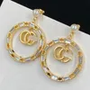 Designer Vrouwen Hoops Charm Oorbellen Goud Kleuren G Vormige Mode Designer Eenvoudige Oorbel Sieraden Luxe Verjaardagscadeau 22101003CZ