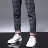 Męskie spodnie Zimowe polarowe spodnie Plaid Men Slim Fit Gruba bawełniana impreza Wysokiej jakości odzież Odzież Przypadkowe spodnie Mężczyzna 2838 221010