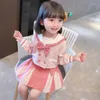 女の子のドレス耕作者の女の子弓ダブル胸長い袖のコートプリーツドレス2pcセット