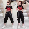 Completi di abbigliamento Tuta sportiva a maniche corte estiva per bambini di moda coreana Tuta da ballo hip-hop per ragazze che esegue abiti jazz