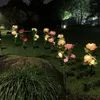 Illuminazione di paesaggio del percorso delle luci del palo del giardino solare della rosa artificiale della primavera per la goccia della decorazione del cortile del patio