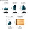 Set di accessori per il bagno Forniture per il bagno in ceramica verde Bottiglia per lozione Spazzolino da denti Tazza Portasapone Vassoio in legno da 5 pezzi