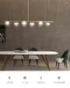 Lampes suspendues Post-moderne lumière luxe restaurant lustre table à manger bande nordique minimaliste LED barre de réception