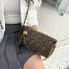 Bolso de lujo Bolsos de moda de alta calidad Almohada de perlas doradas rojas Cartera de moda para mujer Cilindro cruzado único Bolso de diseñador Venta en línea