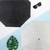 Vêtements de nuit pour hommes Parapluie en treillis en plastique noir créatif Parasol manuel à trois volets Soleil Neuf Contreplaqué Pliant Publicité personnalisée