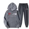 Mens Tracksuits fw22 Trapstar 남성 여성 트랙 슈트 브랜드 인쇄 스트리트웨어 스포츠웨어 Warmtwo 조각 세트 까마귀 바지 조깅 후드 221010