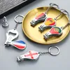 Ouvreurs de la Coupe du monde Football Foothteam Small Gift Flag Pattern Nail Clipper Bottle Ouvreur Keychain Souvenir ZXF7