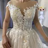 2023 Bollklänning Bröllopsklänningar Dubai Eleganta långa ärmar Sträng besättning Halspetsapplikationer pärlor Vestios de novia lyxiga brudklänningar med knappar