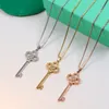 Styles de luxe En Laiton De Luxe Clé Pendentif Colliers Plaqué Or Simple Amour Cuivre Anneau Logo Imprimé Collier Femmes Designer Bijoux