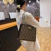 Sacs à main pas chers Sacs 80% de réduction sur les sacs à la mode de haute qualité Chaîne de grande capacité de niche pour femme Fourre-tout en toile Fils coréen mère populaire