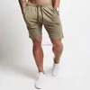 Pantaloncini da corsa da DHL 50 pezzi Pantaloni corti da jogging morbidi da uomo Pantaloni sportivi da bodybuilding sportivi traspiranti in cotone