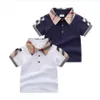 Skjortor Baby Boys Skjorta T-shirt med nedfällbar krage Sommar Barn Kortärmad Rutig T-shirt Gentleman Style Barn Bomull Casual Toppar Dhql9