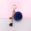 Einfach zu tragen Schlüsselschüben kreativ lustige schöne schöne Kugelspielzeug Bogenknoten Quasten Fruchtfarbe Snap Haken schwimmende Schlüsselkette Geschenk für Frauen