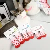 Vêtements de chien 4pcs chaussettes de chiot chaud hiver anti-dérapant petit chat chiens tricot mignon dessin animé protecteur moyen produit pour animaux de compagnie