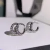 Nouveau charme mode 925 argent lettre géométrie célèbre femmes rondes en acier inoxydable boucles d'oreilles de mariage bijoux accessoires en gros ne se fanent jamais