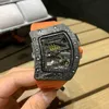 Orologio meccanico completamente automatico da uomo da corsa di Formula 1 in fibra di carbonio, scavato in un'atmosfera luminosa e alla moda