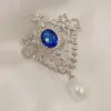 Broches Royal Vintage Open Scroll Azul Oval Piedra Art Deco Broche Insignia Pin Con Perla Gota Prom Gala Vestido De Fiesta Vestido Joyería Victoriana