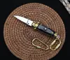 Mini Italien Mafia Keychain Knife Single Action Tactical Self Defense Folding EDC Knifing Camping Knife Xmas Gift A41097521301