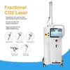 Machine verticale de traitement d'élimination des rides au laser fractionnel Co2 10600nm Laser vaginal serrant l'équipement de beauté faciale du corps pour le resurfaçage de la peau des cicatrices d'acné