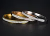 Extrêmement simple Bracelet en or foret de surface lisse et bracelet féminin Europe Europe et les bracelets en or de sable populaires des États-Unis