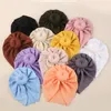 Autumn Winter Solid Color tjock nyfödd hatt pojkar flicka bomull mjuk runda knutbåge turban motorhuven kepsar baby shower rekvisita