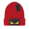 니트 모자 비니 모자 두 눈 패턴 디자이너 두개골 캡 남자 여자 겨울 모자 10 색을위한 캐주얼 스타일