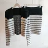 Damen zweiteilige Hosen Sets Winter gestricktes Taschen-Taschen-Knopfmantel und Kurzrockdesigner Langarmer Tracksuiten Casual Fashion Street Show