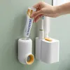 Badtillbehör Set Simple Automatic Tooth Paste Squeezing Device Wallmonterad Tandborste Rack Badrum Hushåll Icke-perforerade tillbehör