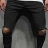 Homme Pantalon Tendance Homme Couleur unie Fermeture éclair Déchiré Trou Mince Streetwear Pantalon Taille médiale Jeune Printemps Pour Usage quotidien