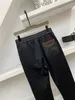 Herbst und Winter 2022 neue schwarze Hosen für Männer, hochwertige Technologie, bequeme Jogginghose aus glattem Material, Top-Marken-Designer-Hosen