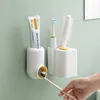 Badtillbehör Set Simple Automatic Tooth Paste Squeezing Device Wallmonterad Tandborste Rack Badrum Hushåll Icke-perforerade tillbehör