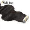 Remy tejp i hårförlängningar kroppsvåg vågig sömlös hud inslag lim mänskliga hårstycken med osynliga dubbelsidiga band 50 g 20st Bellahair 14-24 tum