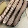 Femmes chaussettes évider collants Sexy maille résille bas élastique jean fond bas collants femme Net pantalon mode