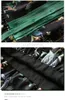 2023 الربيع التلبيب الرقبة الحرير الأزهار طباعة حزام فستان أسود قصير الأكمام واحد الصدر فساتين عادية C2S123197 بدون شريط صور