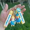 Porte-clés créatif drôle canard tordu clé dessin animé couple silicone poupée pendentif petit sac jaune