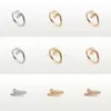 Designer ringen bandMannen klassieke luxe designer sieraden vrouwen ring nagel Titanium staal Vergulde mode-accessoires Vervagen nooit Geen allergisch paar Liefdesring cadeau