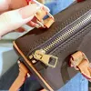 Sacs à main de luxe portefeuilles zipper portefeuilles sacs de bac à bornes de bac à bornes en cuir sac à dos décontracté.